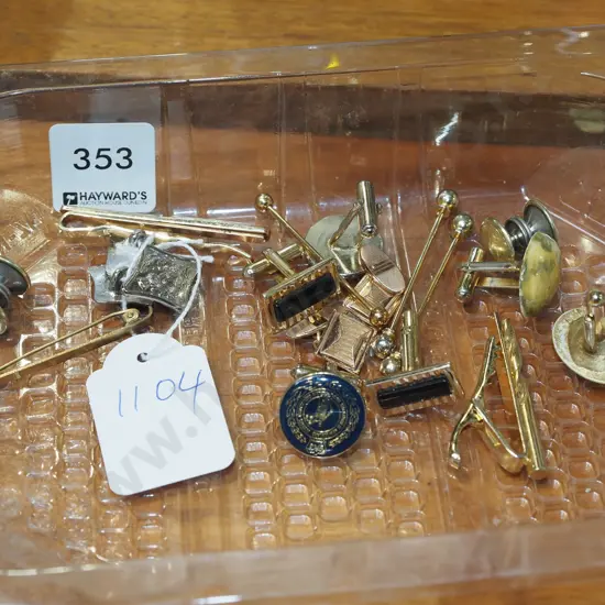 tray of cufflinks, tie pins