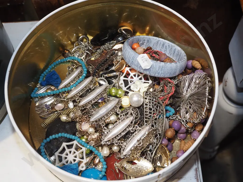 tin of costume jewellery Image 1++