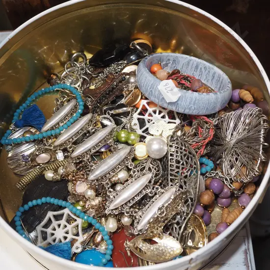 tin of costume jewellery