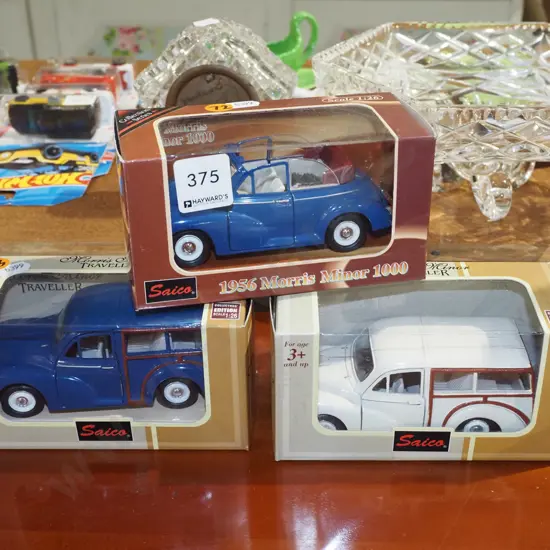 3x boxed Morris Minor scale model toy vehicles