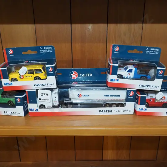 5x cased Caltex toy vehicles
