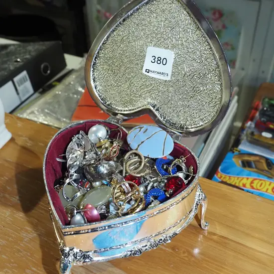 plated heart shaped footed jewellery box and costume jewellery