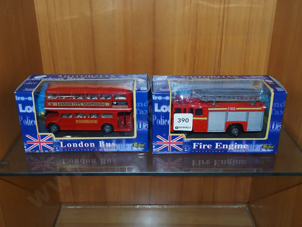 2x boxed diecast toy vehicles; London bus, fire engine Image 1++