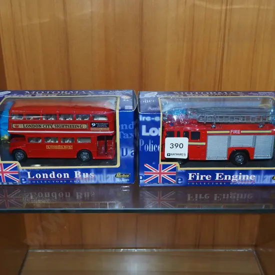 2x boxed diecast toy vehicles; London bus, fire engine