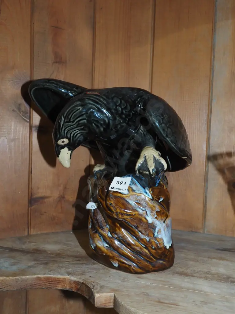 pottery eagle figurine - repair to 1 wing Image 1++