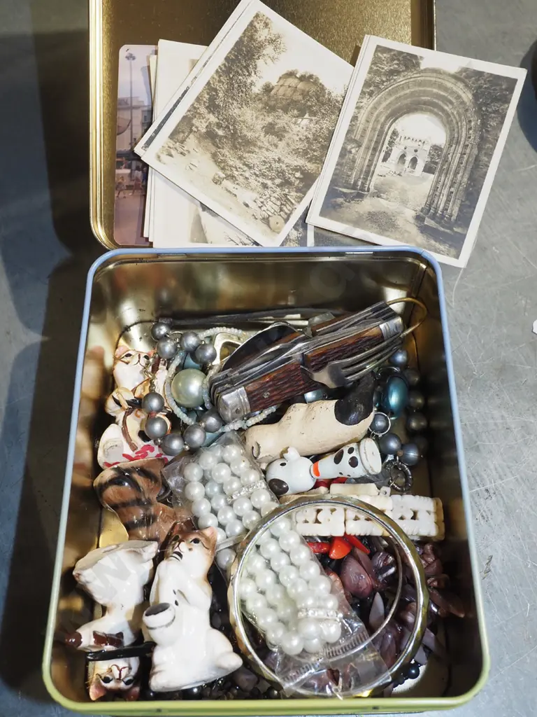 tin of postcards, costume jewellery, figurines etc Image 1++