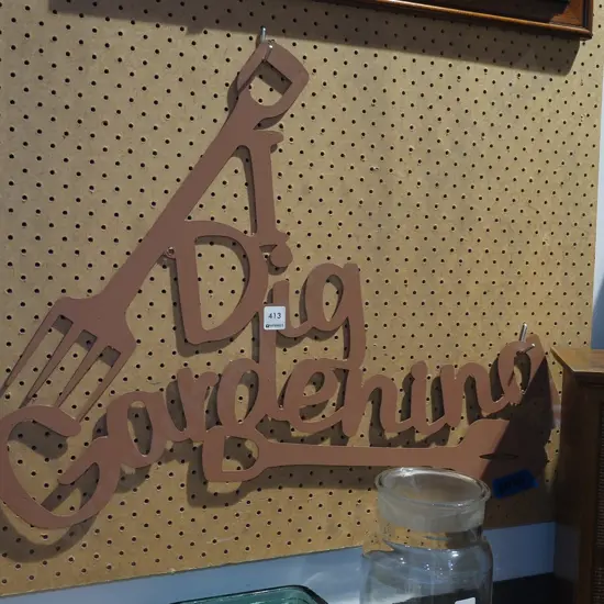 metal cut out I Dig Gardening motto