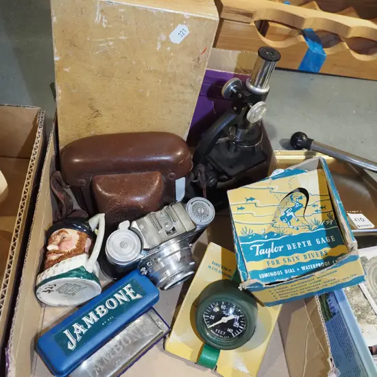 box; microscope, 35mm camera, divers depth gauge etc
