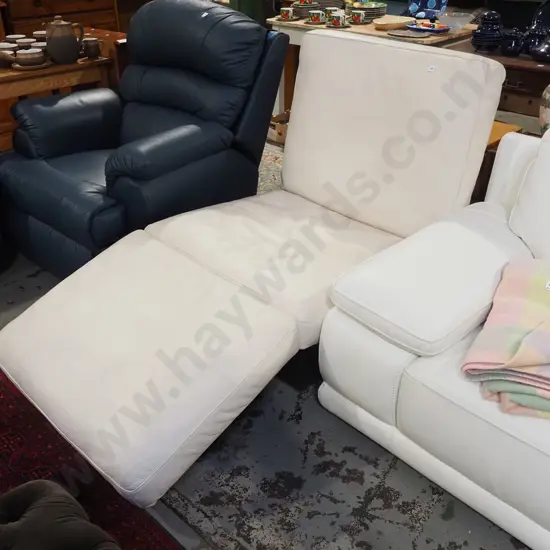 white leather upholstered adjustable chaise lounge - can lie flat as a single bed