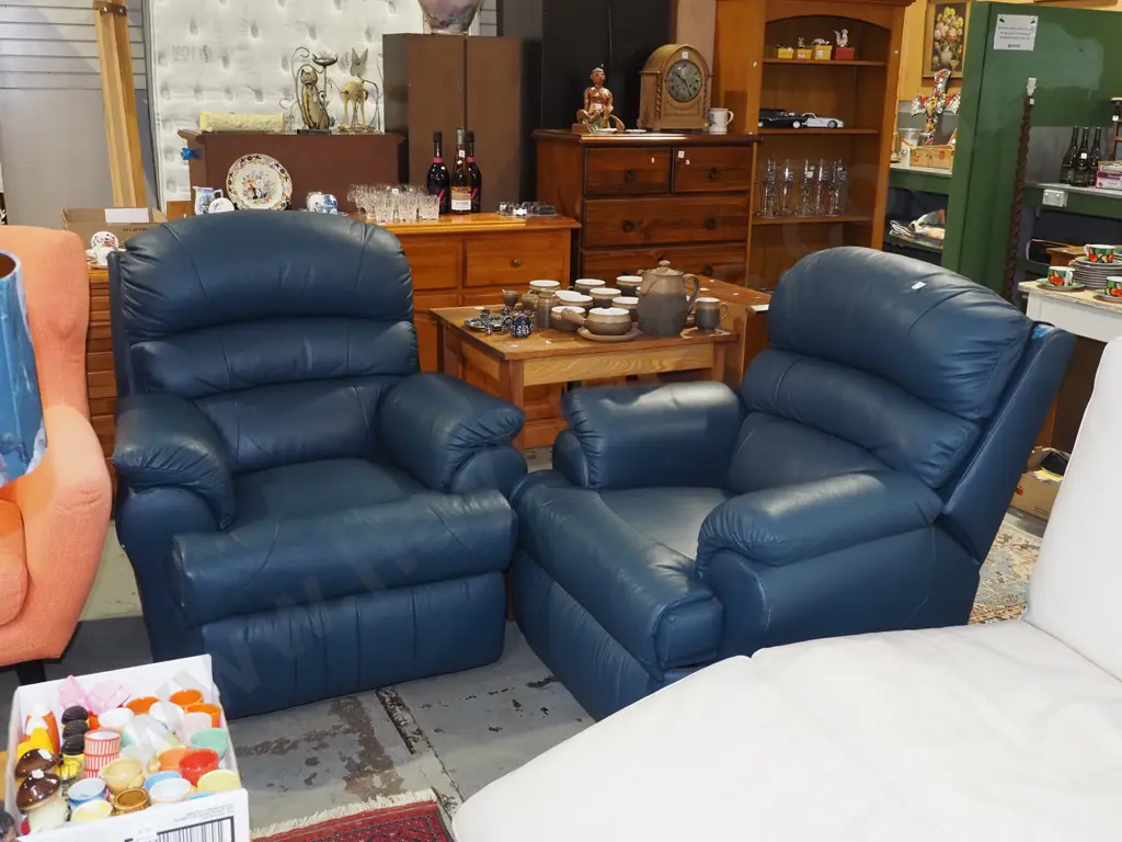 2x blue leather upholstered reclining armchairs Image 1++