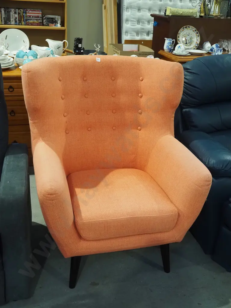 modern orange upholstered wingback armchair - slight fading Image 1++