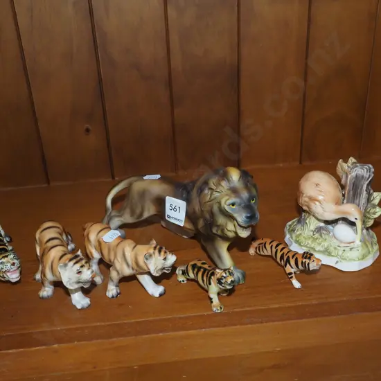 kiwi and egg figurine, tiger and lion figurines