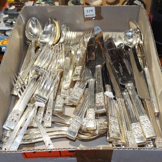 box of plated cutlery