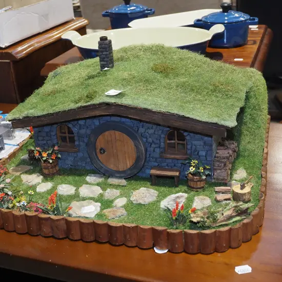 homemade wooden model of a hobbit house W400