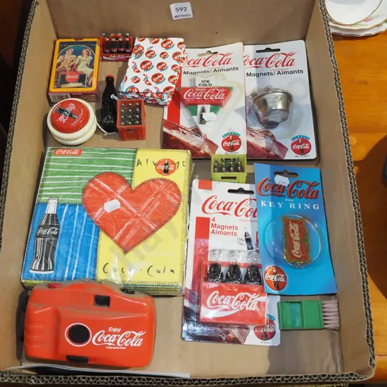 box of Coca Cola items
