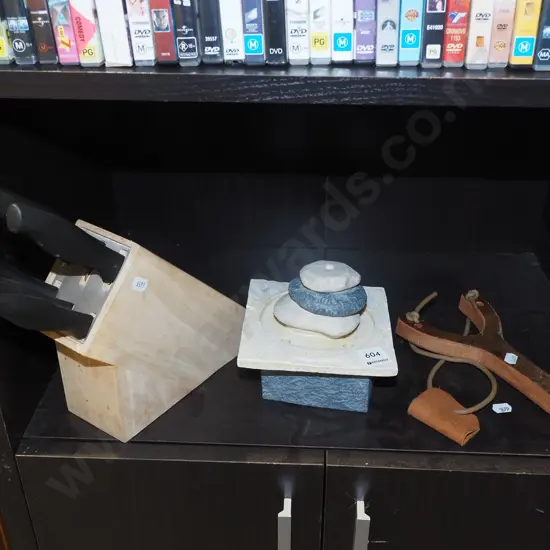 slingshot, small battery powered water feature, knife block