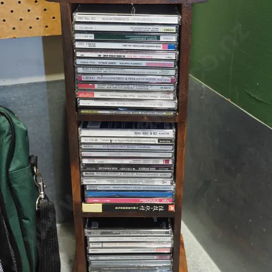 small hardwood CD tower and CDs H470