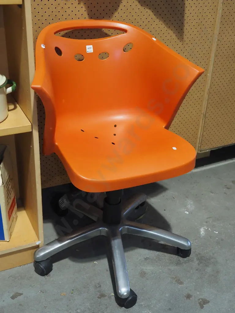 orange plastic office chair Image 1++