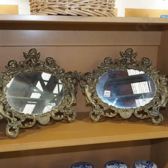 pair of ornate cast alloy fresstanding mirrors Each W410