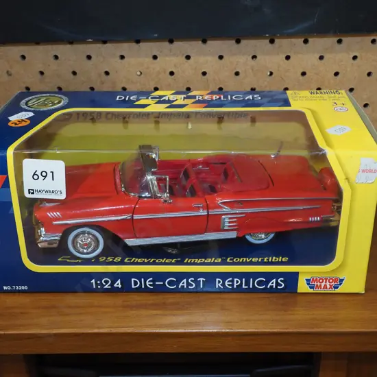 cased diecast model 1958 Chevrolet Impala