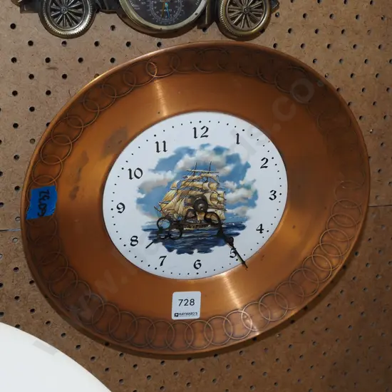 ceramic tile and copper wall clock