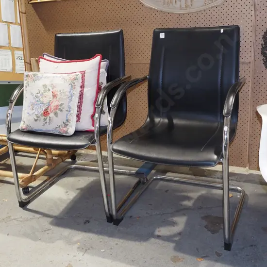 2x chrome and leather reception chairs