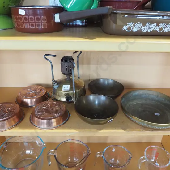copper baking moulds, brass bowls, vintage white spirit camp stove