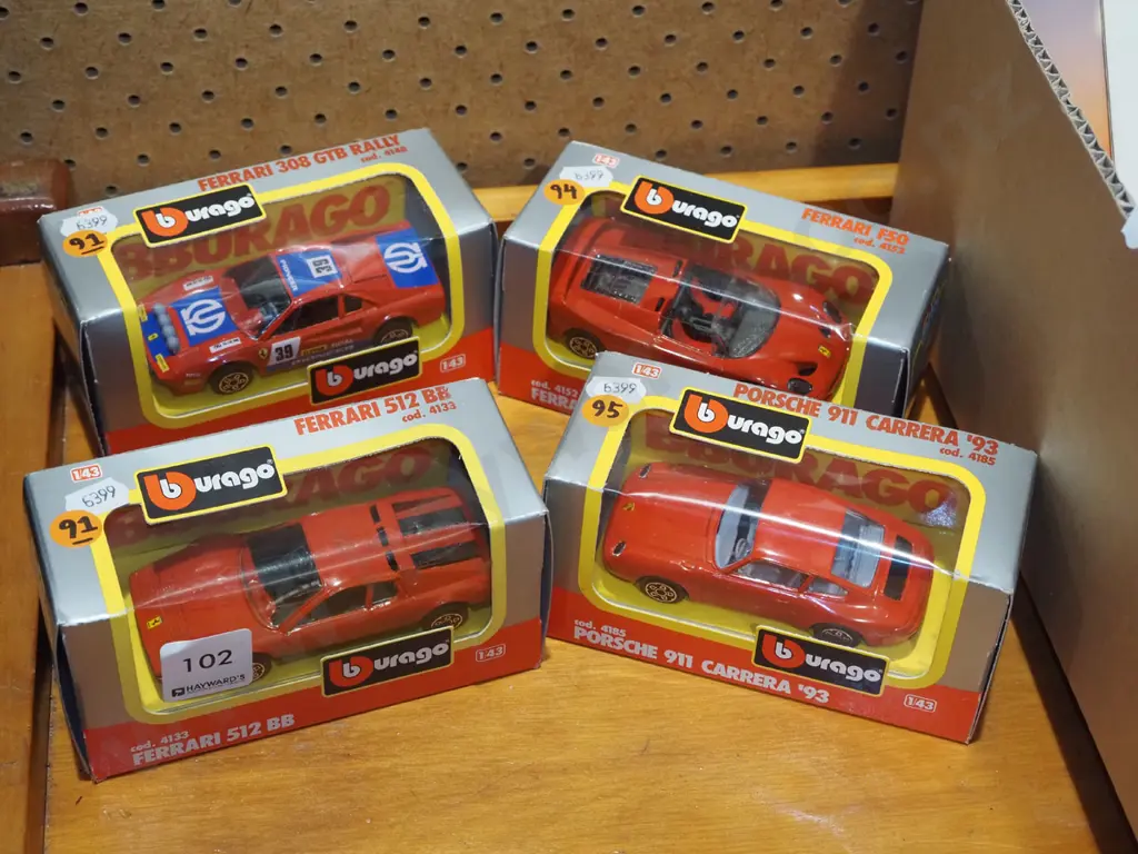 4 Burago boxed model vehicles Image 1++