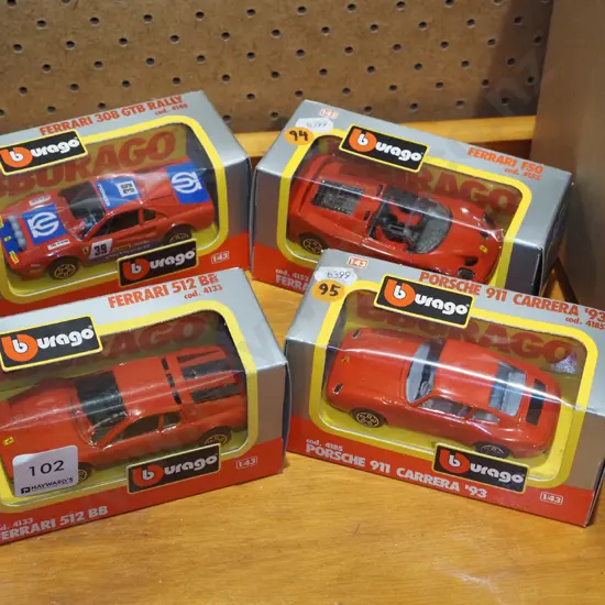 4 Burago boxed model vehicles