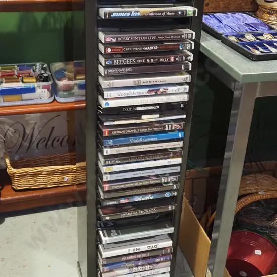 DVD tower and DVDs H880