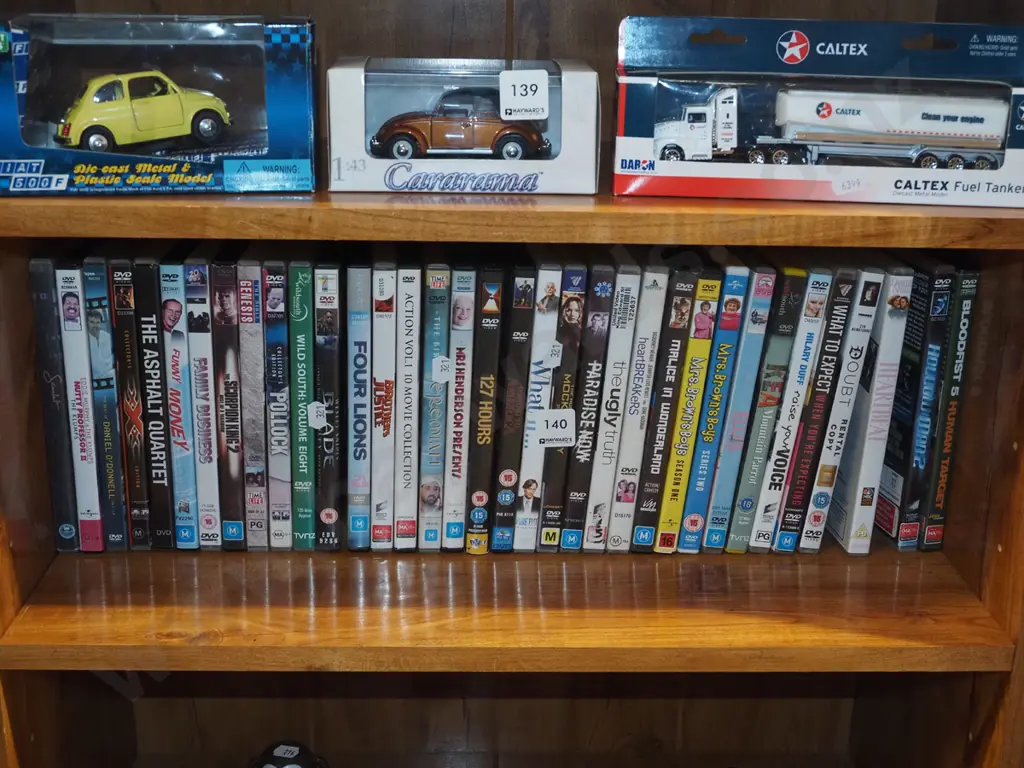 shelf of DVDs Image 1++