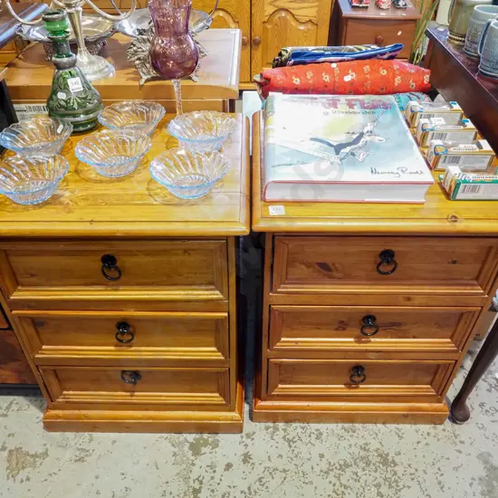 pair of solid pine 3 drawer bedside cabinets with drop metal handles