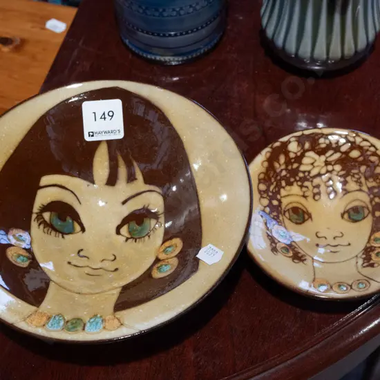 2x studio pottery wall hanging bowls, female portraits