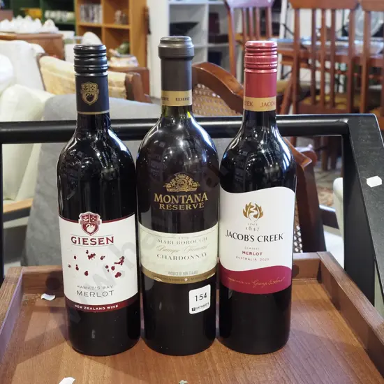 bottle of Hawkes Bay merlot 2022, Marlborough chardonnay, Jacobs Creek merlot 2023