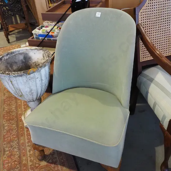 green upholstered bedroom chair