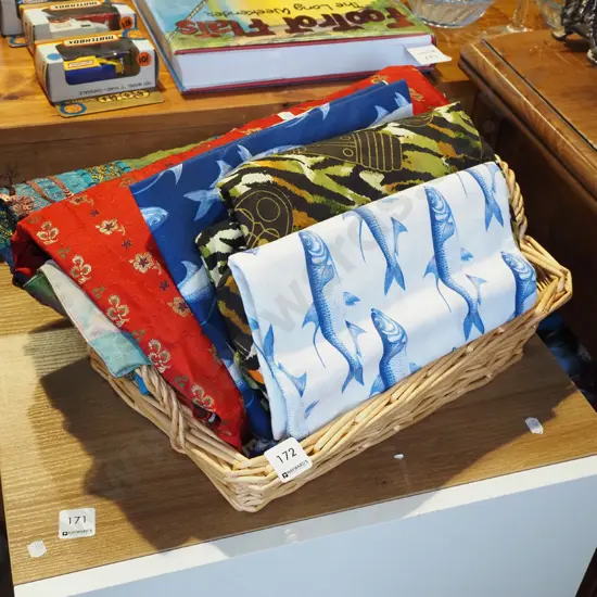 cane basket, fabric pieces