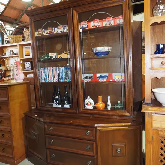 mahogany wall unit with 2 glazed display doors over 3 solid doors, 3 drawers 