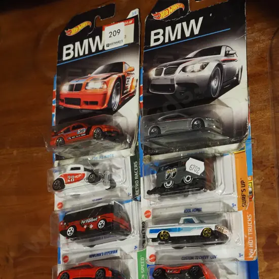 8x as new carded Hotwheels toy vehicles