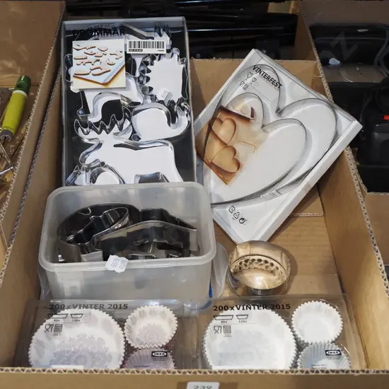 box; assorted cookie cutters, patty cups
