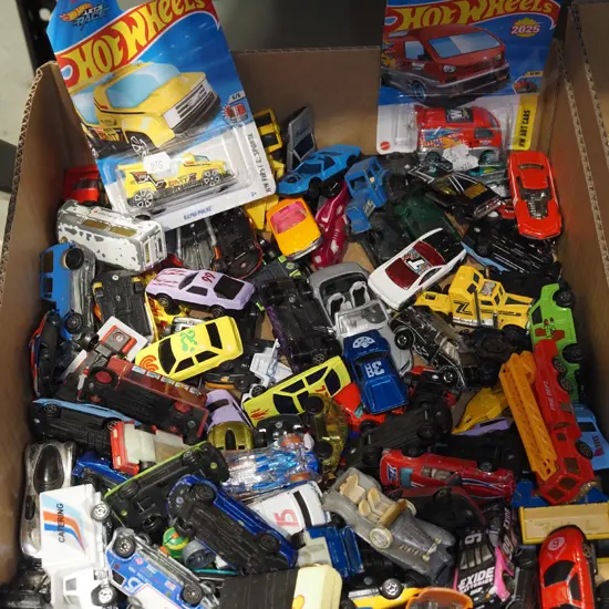 box; various toy vehicles