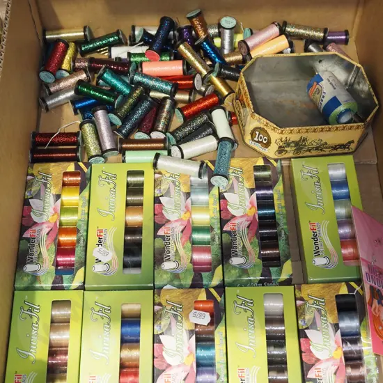 box of sewing threads