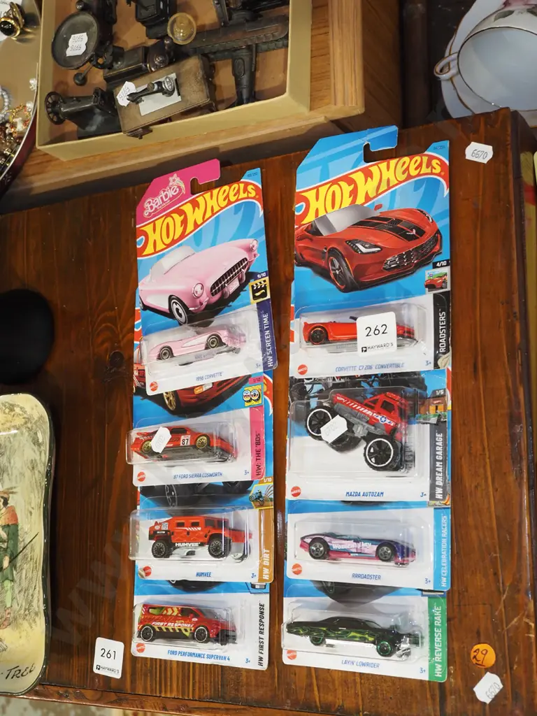 8x as new carded Hotwheels toy vehicles Image 1++
