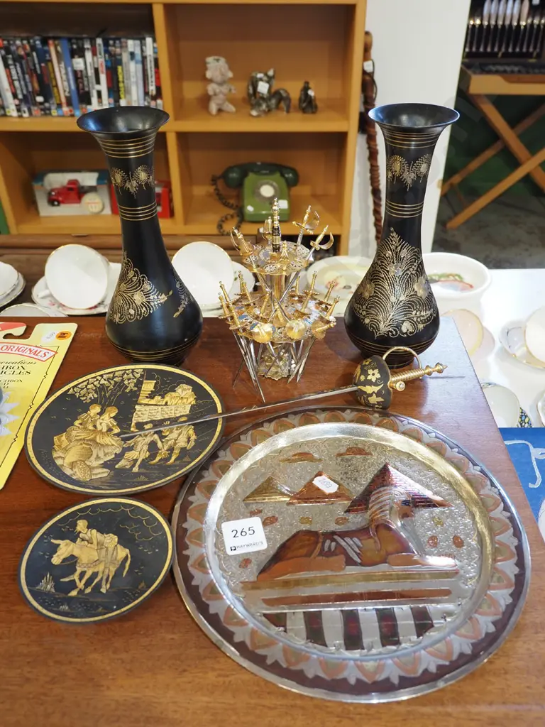 pressed metal and brass Egyptian wall charger, etched brass vases, sword cocktail sticks etc Image 1++