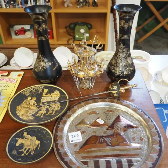 pressed metal and brass Egyptian wall charger, etched brass vases, sword cocktail sticks etc