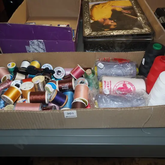 box of sewing threads