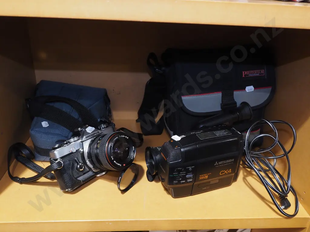 Olympus OM-1 35mm SLR film camera, Mitsubishi CX4 VHS-C camcorder Image 1++
