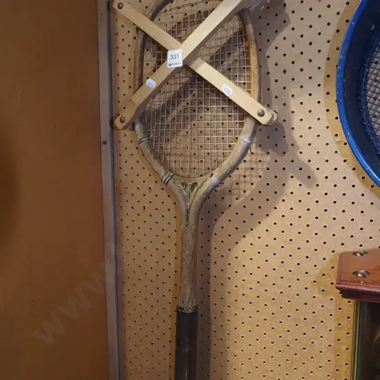 vintage tennis racket and brace