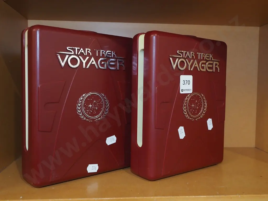 2x plastic cased sets of Star Trek Voyager DVDs Image 1++