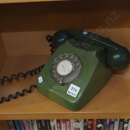 green plastic dial telephone