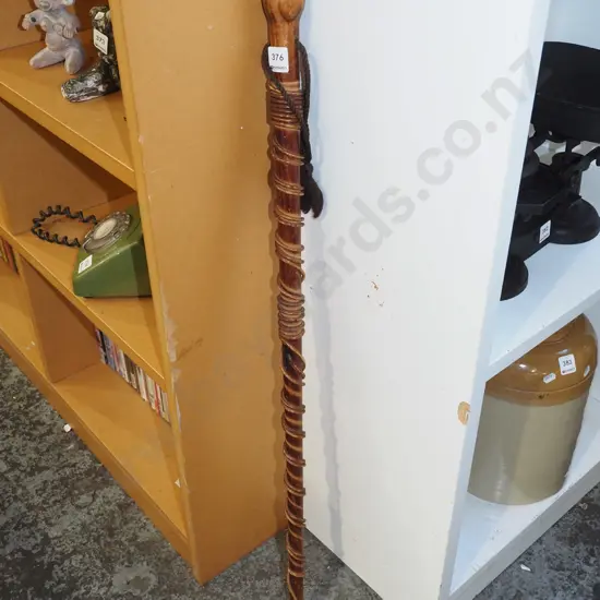 wooden walking stick with inlay paua